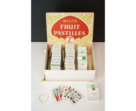 A collection of loose vintage cigarette cards contained within vintage Woodbune cigarette boxes. 
