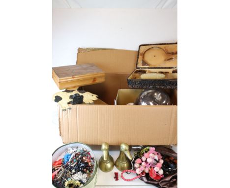 A box of mixed collectables to include costume jewellery, brass ornaments and a vintage vanity set. 