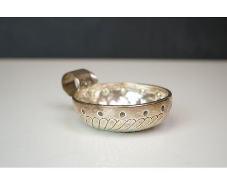 A vintage white metal wine tasting cup engraved to the rim "Henri Truchon". 