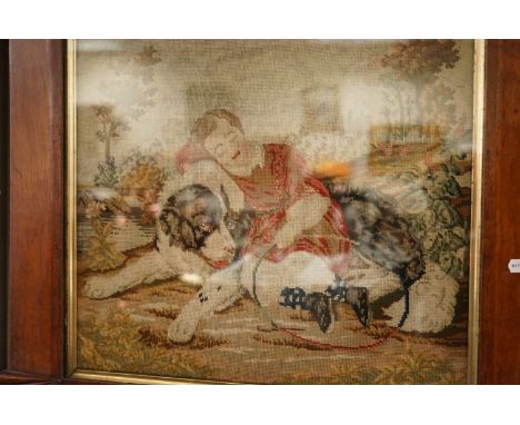 An antique oak framed Belgian tapestry of a child with St Bernard Dog..