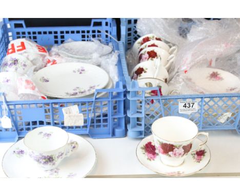 A vintage bone china part tea set hand painted with flowers and a gilt rim together with six Queen Anne bone china trio's. 