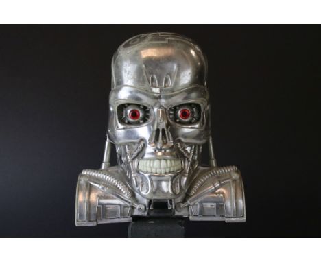 A plastic bust of a futuristic Robot. 