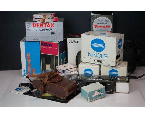 A collection of photography equipment to include a Pentax PC35AF-M, A Minolta X700 and a Olympus XA Rangefinder with flash. 