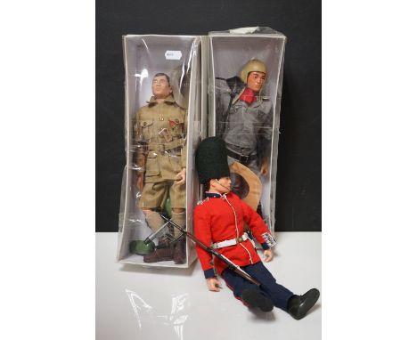 A collection of three vintage Action man figures to include a German Luftwaffe pilot and a Guard.
