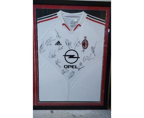 Football Autographs - Large framed &amp; glazed 2005 Champions League Liverpool v AC Milan signed shirt montage.  Piece conta