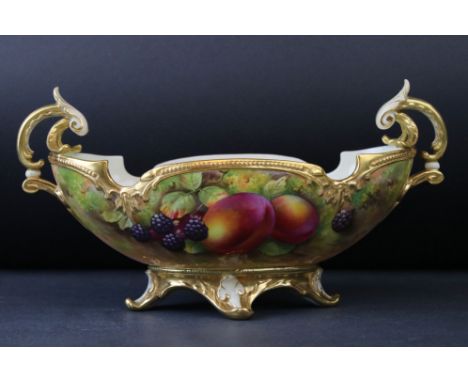 A 20th century Royal Worcester two handled baskets with fruit and berry decoration signed E Townsend puce mark to base. 