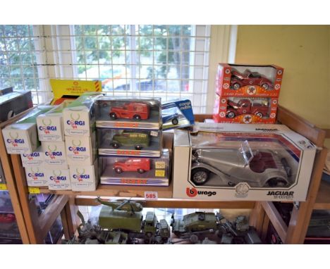 Diecast:&nbsp;a shelf of various modern boxed diecast vehicles, to include examples by Burago, Corgi and Dinky, various scale