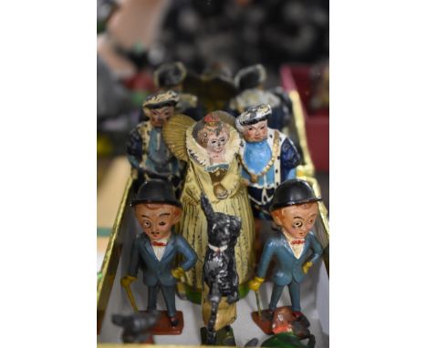 Britains:&nbsp;two vintage Sharps toffee 'Sir Kreemy Knut'&nbsp; lead figures; together with three 'Madame Tussauds' figures,