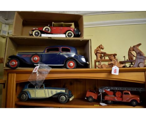 A vintage Gama tinplate fire engine;&nbsp;together with three further tinplate cars.&nbsp;(4) 