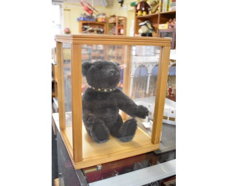 Steiff:&nbsp;a 2007 'Jack the Rare Black' alpaca bear, having green leather studded collar, No.662546, 30cm high, limited edi