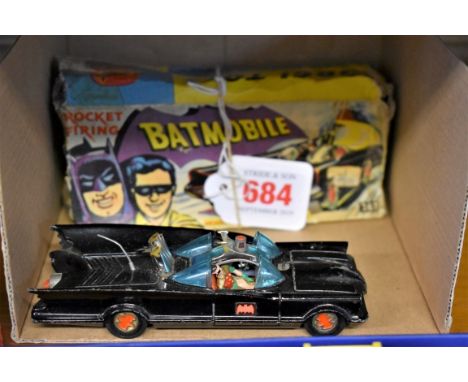 Corgi Toys:&nbsp;a vintage diecast Batmobile, No.267, in remains of original box, (missing rockets). 