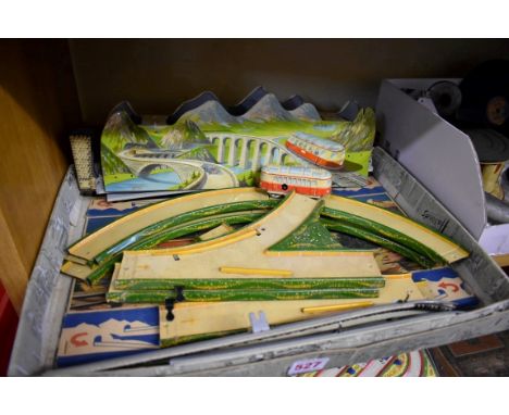 A vintage tinplate clockwork Technofix 'Mountain Express' train set, to include one coach, (no key). 