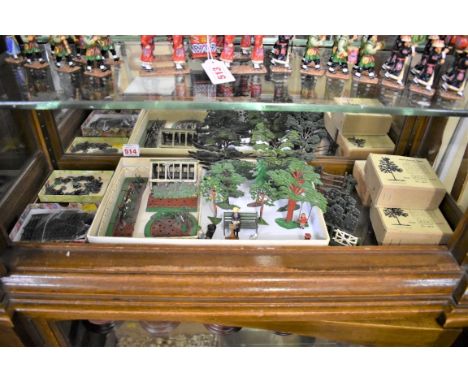 Britains Garden:&nbsp;an extensive collection of vintage lead, to include: flowerbeds and flowers; garden bench with seated c