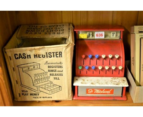A vintage metal painted 'St Michael' cash register,&nbsp;complete with cardboard coins and paper notes, in original box. 