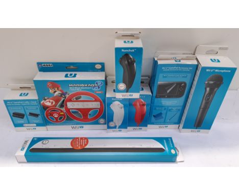 Nintendo, a boxed Group of Peripherals for the Nintendo Wii U. Includes Wii U Gamepad Accessory Set x2, White Nunchuk, Red Nu