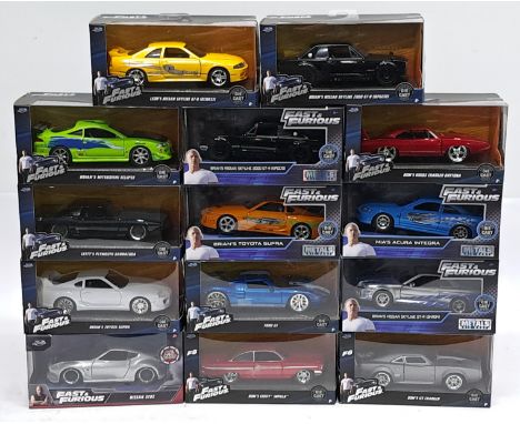 Jada, Fast &amp; Furious, 1:32 scale, a boxed Car group. &nbsp;Includes Dom&rsquo;s Ice Charger, Brian&rsquo;s Mitsubishi Ecl
