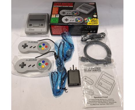Nintendo, a boxed SNES (Super Nintendo Entertainment System) Classic Mini Console. Although untested if in working order cond