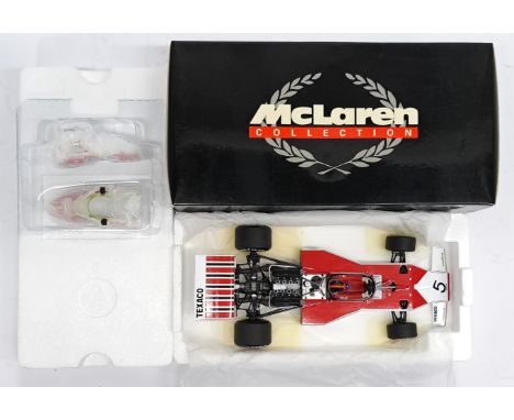 Minichamps McLaren Collection, 1:18 scale, McLaren Ford M23 - L. Fittipaldi&nbsp;&ndash; 1974, boxed. &nbsp;Although unchecke
