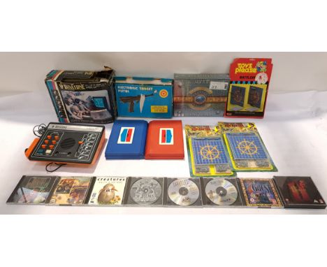 A mixed Video Game and Board Game Group. Includes Binatone Home Game Console, Star Wars Dark Forces with others. Although unt