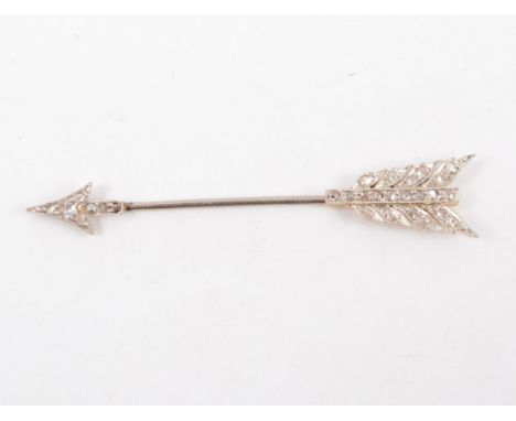 A diamond set arrow tie bar, the arrow head and fletching set with rose cut diamonds, overall length 50mm.
