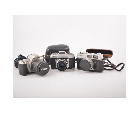 Canon E05300 camera, other cameras. and two pairs of binoculars
