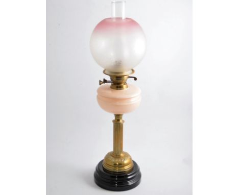 Edwardian oil lamp, acidet shade, opaque reservoir, brass column, circular base, with chimney, 69cm.