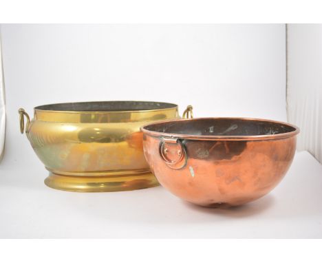 Oval brass jardiniere; brass jam pan; and a copper basin.