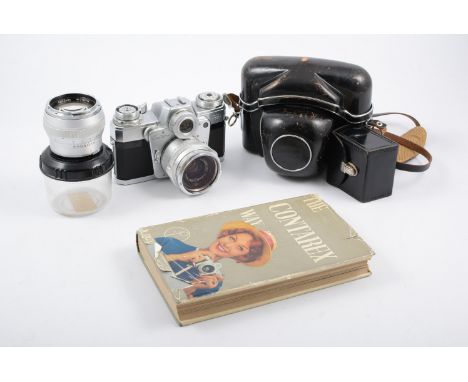 Ziess Contarex Camera, in original case, with a Planar 55mm lens nr.3596949, a Distagon 35mm lens nr.3186796, UV filter, lens