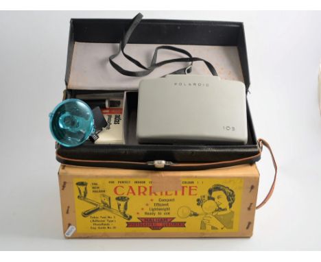 Collection of vintage cameras, including Olympus Pen-D, Polaoid, acessories, light meters etc. 
