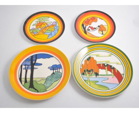 Fourteen Wedgwood Clarice Cliff small plates, with certificates; three Wedgwood Clarice Cliff large plates, with certificates