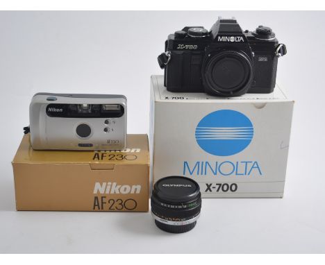 Collection of camera equipment, including Minolta X-700, Polaroid 600 buiness edition, other lenses, flahses etc. 