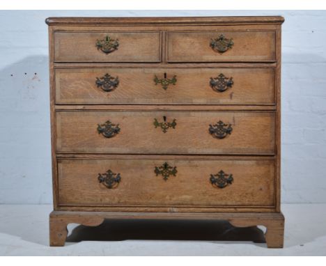 Georgian oak chest of drawers, rectangular top, moulded edge, two short and three long graduating drawers, bracket feet, widt