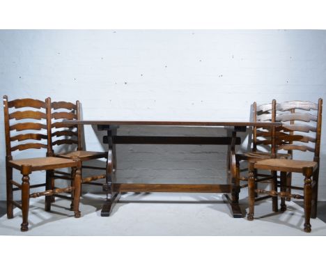 Oak refectory type dining table, together with a set of ladder-back chairs.