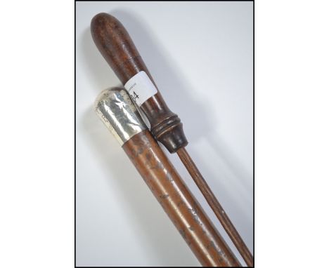 A silver topped swagger stick with notation OBP 41st Regt together with a 19th century rifle cleaning rod.