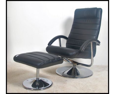 A vintage 20th century black leather Breuer style adjustable reclining chair with matching footstool.  These come with circul