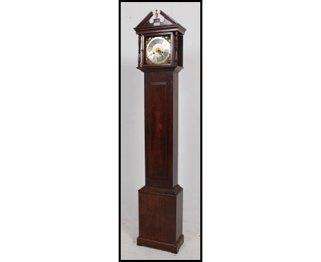 A Mahogany Longcase Grand-daughter Clock, having a brass dial with notation for Richard Broad Bodmin. With a  moulded swan-ne