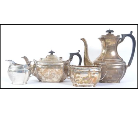 An Edwardian matching four piece silver coffee and tea service by George Harrison Brothers and Howson or possibly George Hape