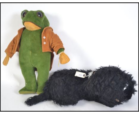 A Wind In The Willows Mr Toad Of Toad Hall stuffed (mostly straw) vintage plush toy .  This is complete with corduroy tailcoa