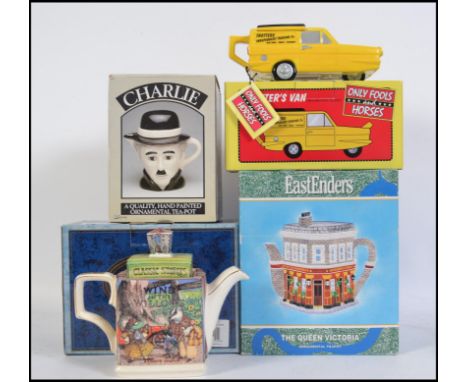 A group of collectable novelty teapots to include East Enders Queen Vic, Only Fools and Horses ' Trotters Van ', Charlie Chap