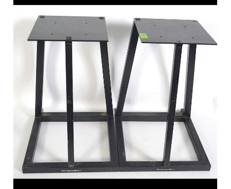 A good pair of 20th century Mordaunt-Short tubular metal speaker stands .  Black with affixed embossed logo to front .