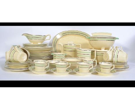 A 1930's Art Deco ceramic dinner / tea service by Bristol in the Auberone pattern comprising plates, teapot, meat dish, sauce