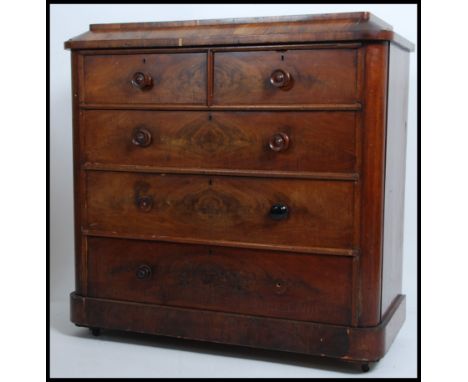 A Victorian mahogany large caddy top chest of drawers raised on plinth base with castors having 2 short over 3 deep graduatin