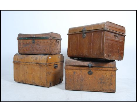 A collection of 19th century tin - metal trunk chests - ideal tack chests all with hinged lids. Of varying sizes and colours 