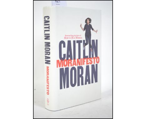 Caitlin Moran - Manifesto - signed First Edition. Published by Ebury Press, 2016. In blue cloth with white unclipped dust cov