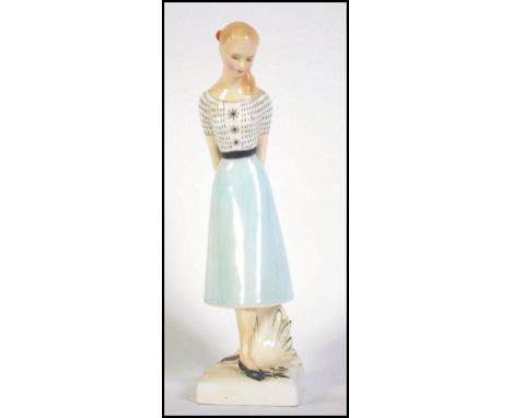 A Royal Doulton ceramic 1950's Lady Teenagers Figure ' Sweet Sixteen ' HN 2231 by Peggy Davies. 20cms