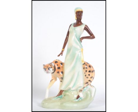 A Royal Doulton Art Deco style Bone China figure " Charlotte " HN3810 still retaining original box. 24cms high 