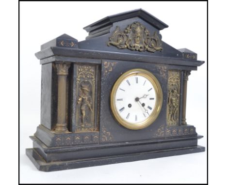 A 19th century Victorian  French slate and marble architectural cased mantle clock. With an eight day movement marked for R. 