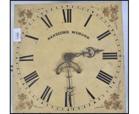 A 19th century painted face longcase clock movement with chains. The dial being marked for Hanscomb Woburn. ( see illustratio