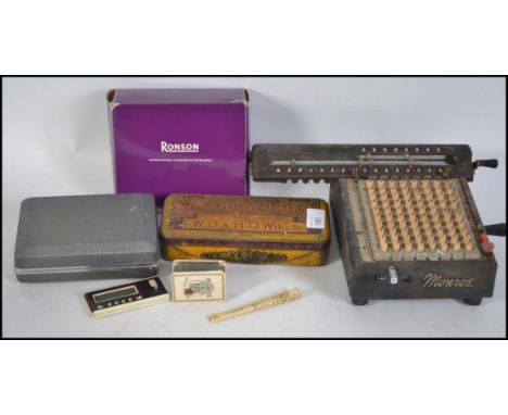 A collection of vintage 20th century items to include a Monroe Tabulater with cover, a boxed Ronson electric shaver, Wills ci