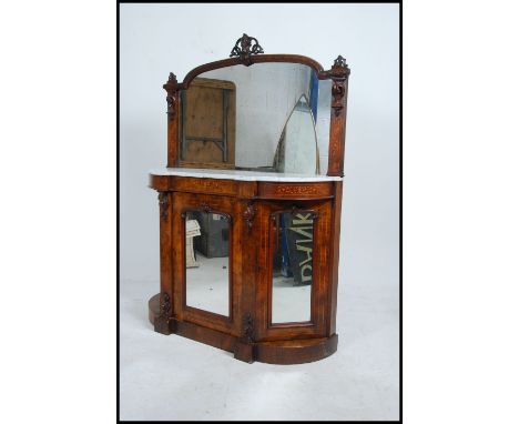 A Victorian walnut marquetry inlaid marble top mirror back Credenza sideboard. Raised on shaped plinth with mirror glass door